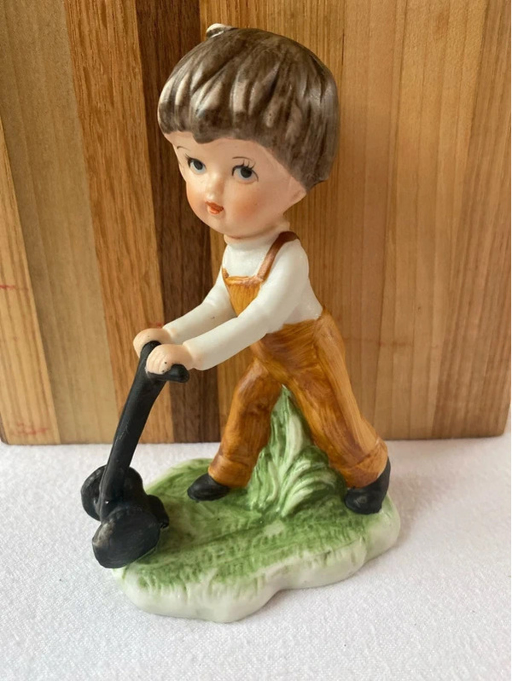Vintage Ceramic Figurine of Young Boy with Mower